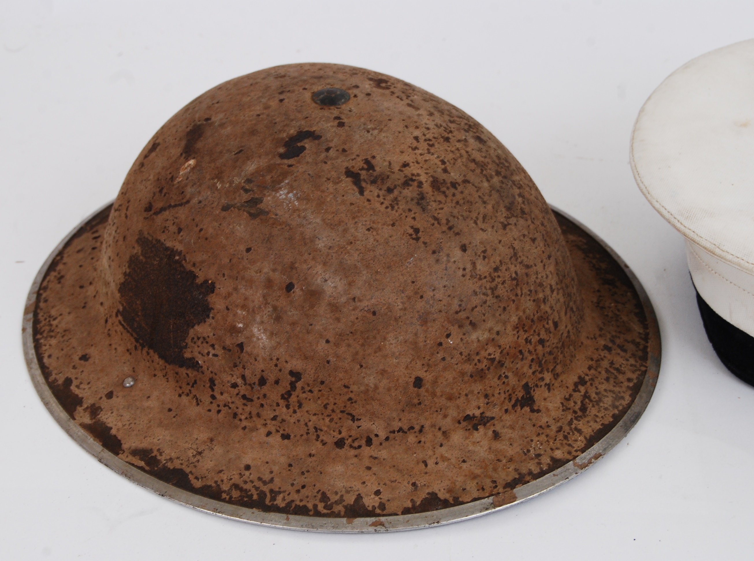 UNIFORM HATS: A vintage WWII Second World War tin helmet with original liner, - Image 2 of 4