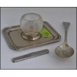 An Elkington silver plate and glass bowl match strike and ash tray combination,