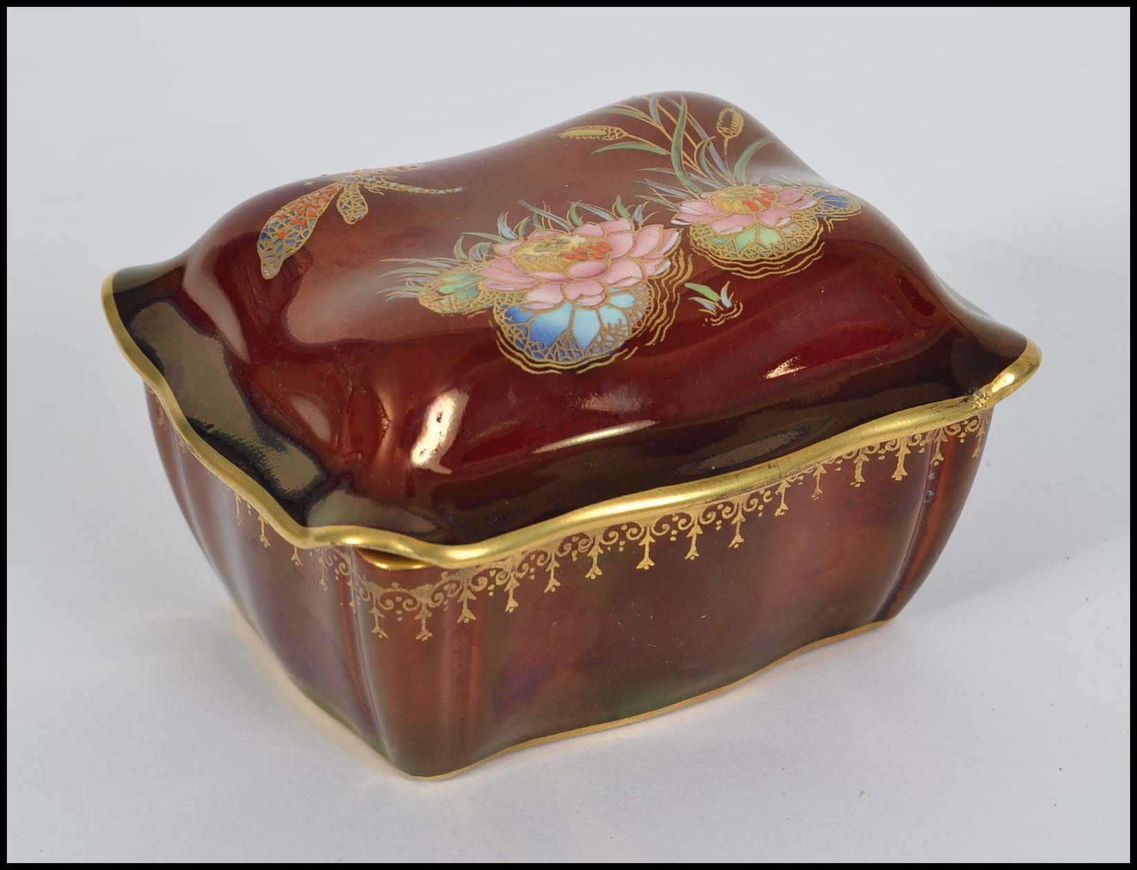 A early to mid 20th century hand painted Carlton Ware ' Rouge Royale ' cigarette box,