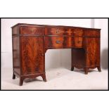 A large Canadian mahogany inlaid Federal / Regency bow front sideboard originally belonging to