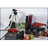 A collection of vintage 35 mm cameras to include Voigtlander, Practica, lenses,