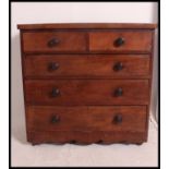A Victorian mahogany chest of drawers having 2 short over 3 deep configuration.