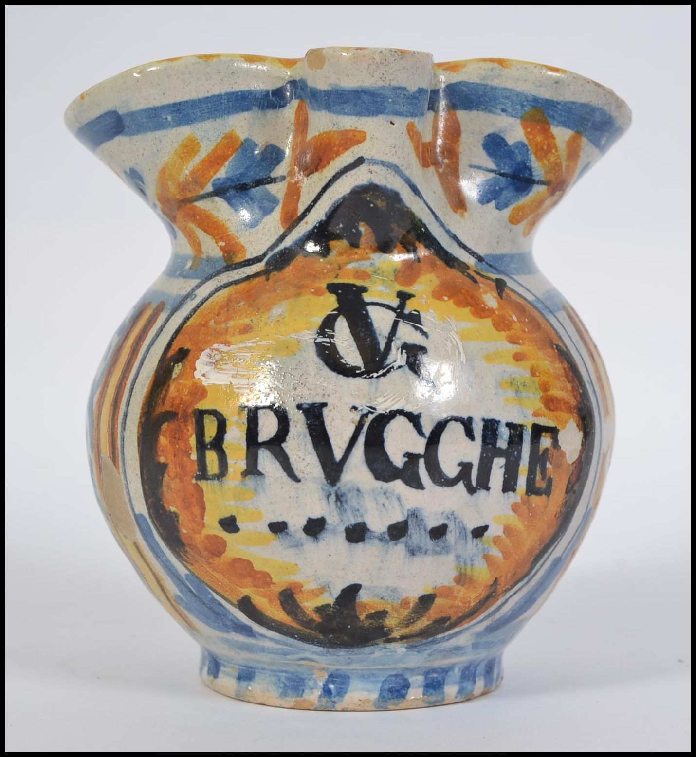 A Small 19th Century Faience possible Apothecary Jug inscribed V G BRVGGHE below the pinched spout