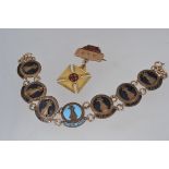 A vintage National Teachers of Dance enamel badge bracelet being re-fashioned together with a bar