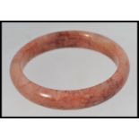 A Chinese 20th century jade bangle,