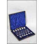 A cased set of silver hallmarked apostle teaspoons complete in the original velvet lined case.