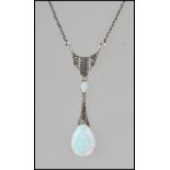 A 20th century Art Nouveau ladies silver and opal set pendant and necklace,