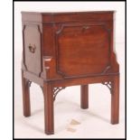 A 19th century mahogany wine cooler of square form raised on Chinese Chippendale legs having