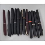 A collection of old 20th century / mid century fountain pens by Osmirod to include black cases,