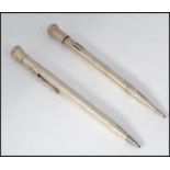 2 silver hallmarked 20th century propelling pencils,