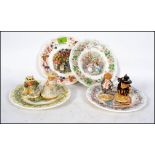 A collection of Royal Doulton Bramley hedge figures and four seasonal plates to include Wilfred