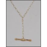 A 9ct gold pendant chain necklace with a bar pendant.