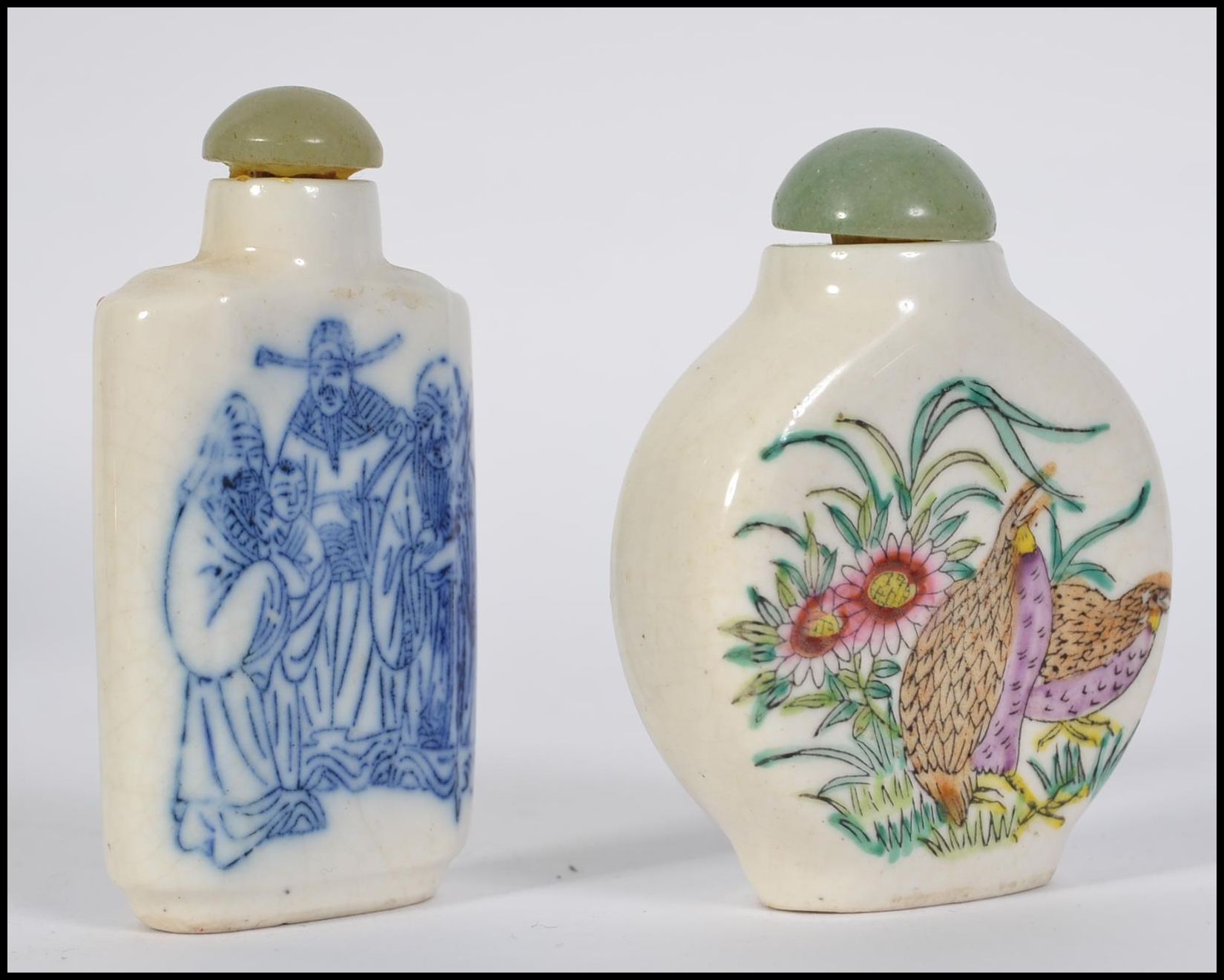 Two 20th century Chinese ceramic snuff bottles both with Jadite stoppers,