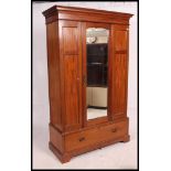 A good Edwardian solid mahogany wardrobe.