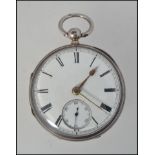 A silver hallmarked pocket watch with inset movement marked serial no 3095.