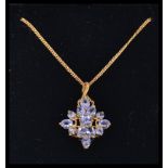 A 9ct gold and tanzanite ladies pendant and 9ct gold necklace chain.