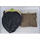 A vintage ladies white metal silver plate mesh clutch bag purse together with a 1920's lucite clip