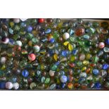 A collection of vintage glass marbles to include bulls eyes etc please see images