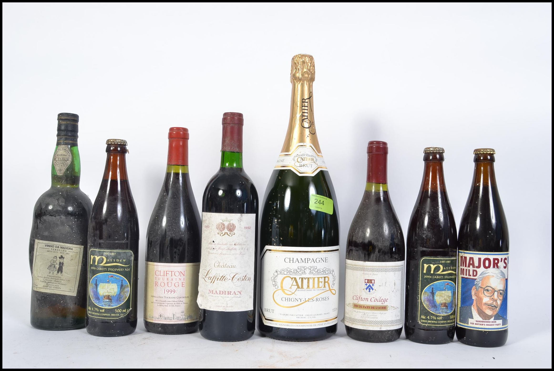 A collection of bottled Wine, Beer and Champagne to include a Magnum of Cartier champagne,