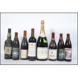 A collection of bottled Wine, Beer and Champagne to include a Magnum of Cartier champagne,