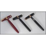 A collection of 3 vintage fountain pens to include Parker 14ct nib in maroon,