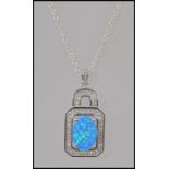 A ladies silver cz and blue opalite pendant necklace and silver chain.