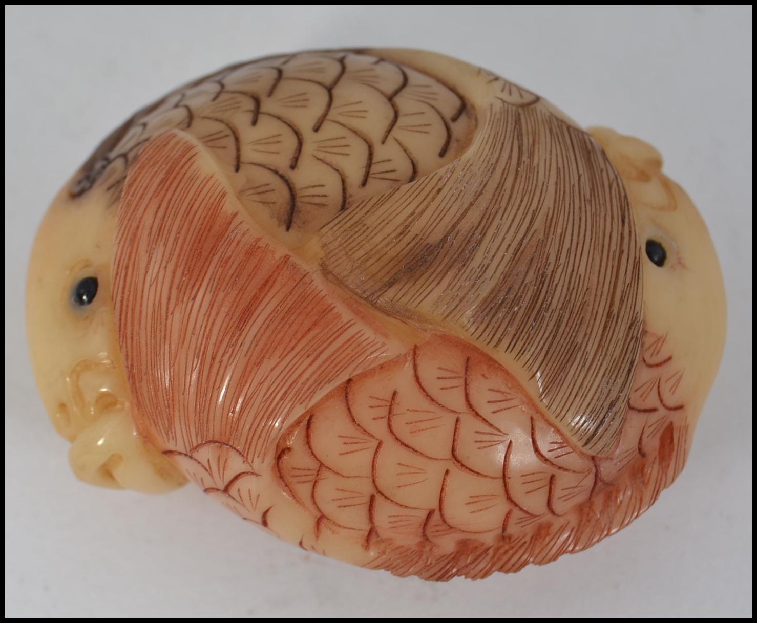 An unusual Chinese carving / netsuke type in the form of two intertwined carp fish