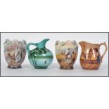 A collection of four small ceramic lustre jugs of Bavarian form,