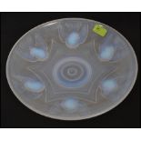 An 1930`s French Ezan opalescent glass dish in the manner of Lalique moulded with birds,