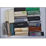 A collection of cased 20th century fountain pens and ballpoint pens to include examples by Parker,