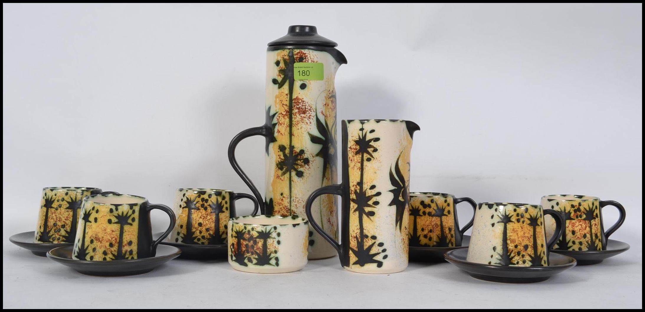 A stunning 20th century Cornish Celtic Pottery coffee set having 15 pieces comprising cups, teapot,