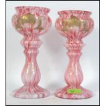 A pair of late 19th early 20th century glass mottled baluster vases,