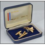 A pair of gold plated gentleman's suit cufflinks in the form of Concorde,