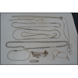 A collection of silver and white metal necklaces and chains to include hallmarked chunky linked