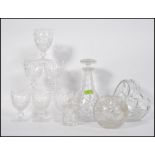 A large collection of crystal glass wares a majority of which is Stuart and also to include several