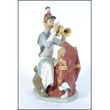 A Lladro figure ' Practice makes Perfect ' Limited edition of 1306 / 5000 Norman Rockwell Special