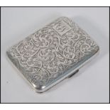 A pretty chase decorated silver hallmarked cigarette case,