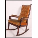 A Regency mahogany rocking chair - armchair.