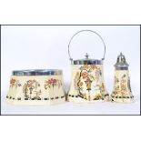 A Parrott and Company Coronet Ware biscuit barrel along with a matching dish,