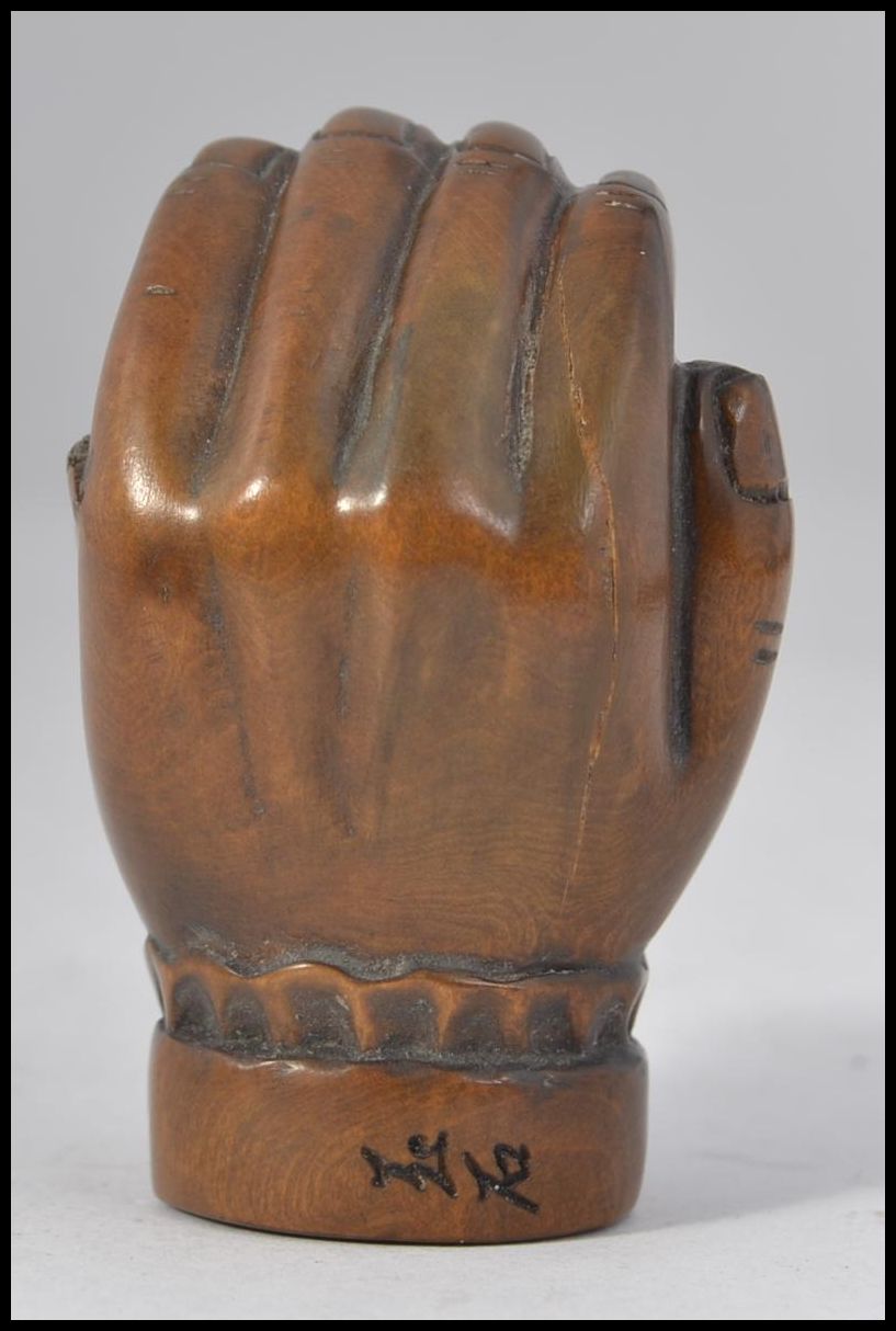 A carved fruitwood Chinese / Japanese netsuke in the form of a hand bearing signature to the base - Image 2 of 4