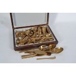 A fabulous 20th century bronze canteen of cutlery complete in the wooden presentation case imported