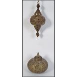 A near pair of early 20th century Islamic Morrocan / Turkish brass lanterns / incense lanterns