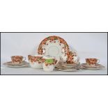 A late 19th century Clifton China porcelain tea service, puce transfer decorated Imari design,