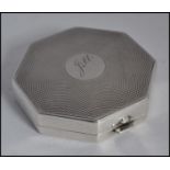 A silver hallmarked compact, with Birmingham Assay marks,