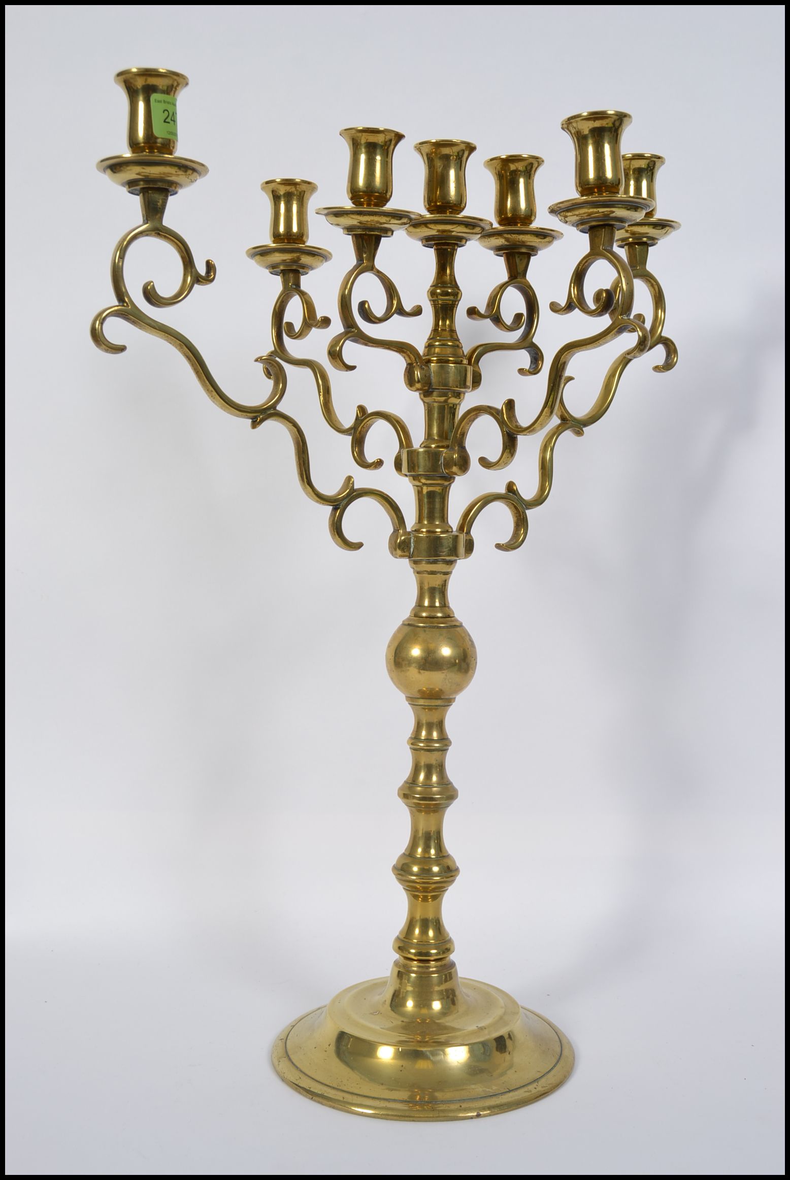 A large 20th century brass candelabra,