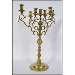 A large 20th century brass candelabra,