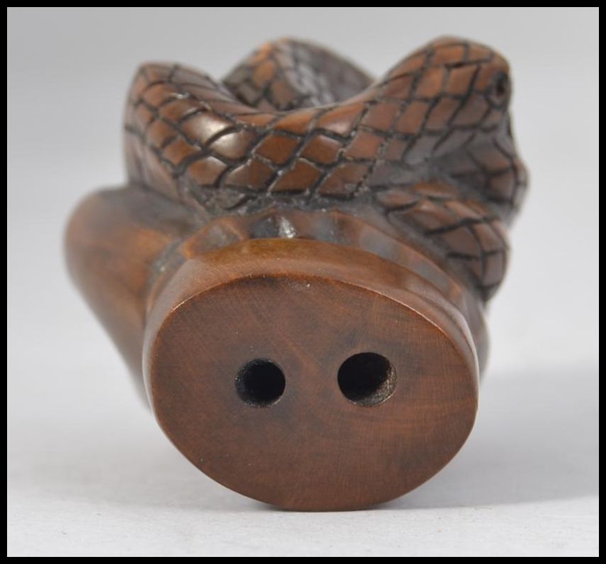 A carved fruitwood Chinese / Japanese netsuke in the form of a hand bearing signature to the base - Image 4 of 4