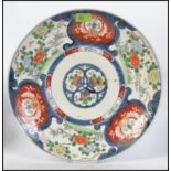 A 19th century large Chinese Imari wall charger.