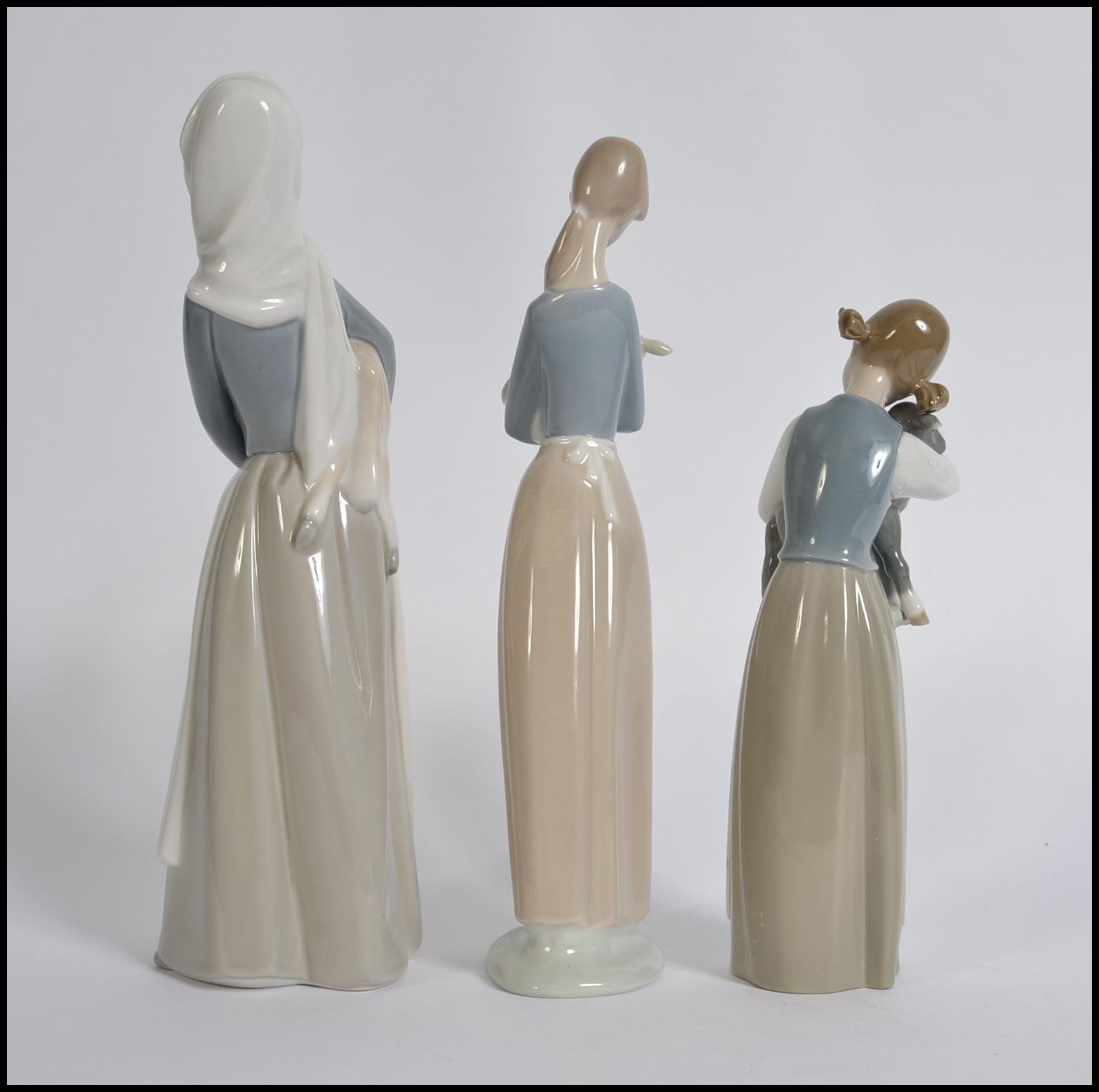 A collection of three Lladro porcelain figurines of young girls with animals, - Image 3 of 5
