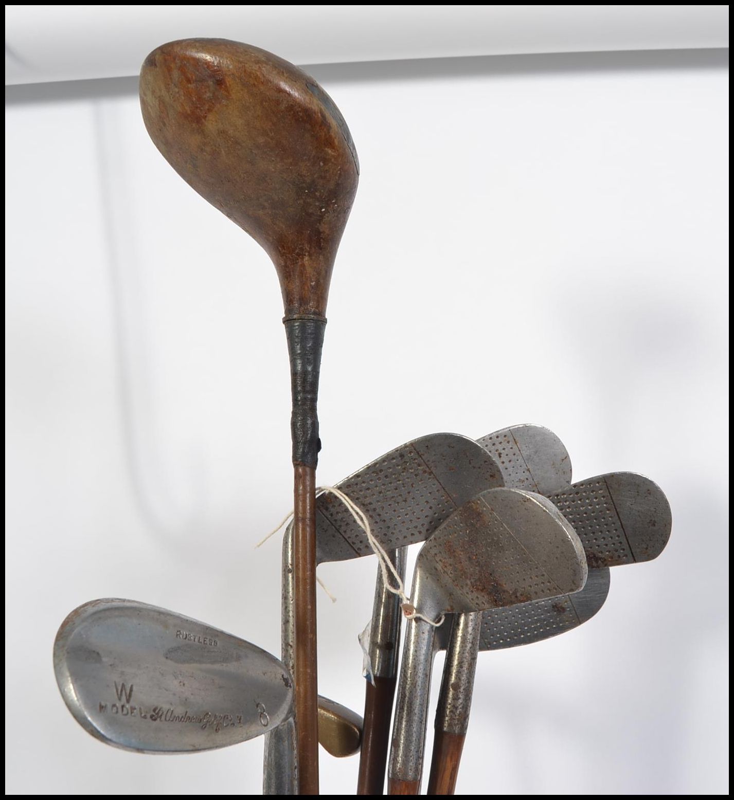 A collection of vintage gold clubs being marked for St Andrews ( see illustrations )